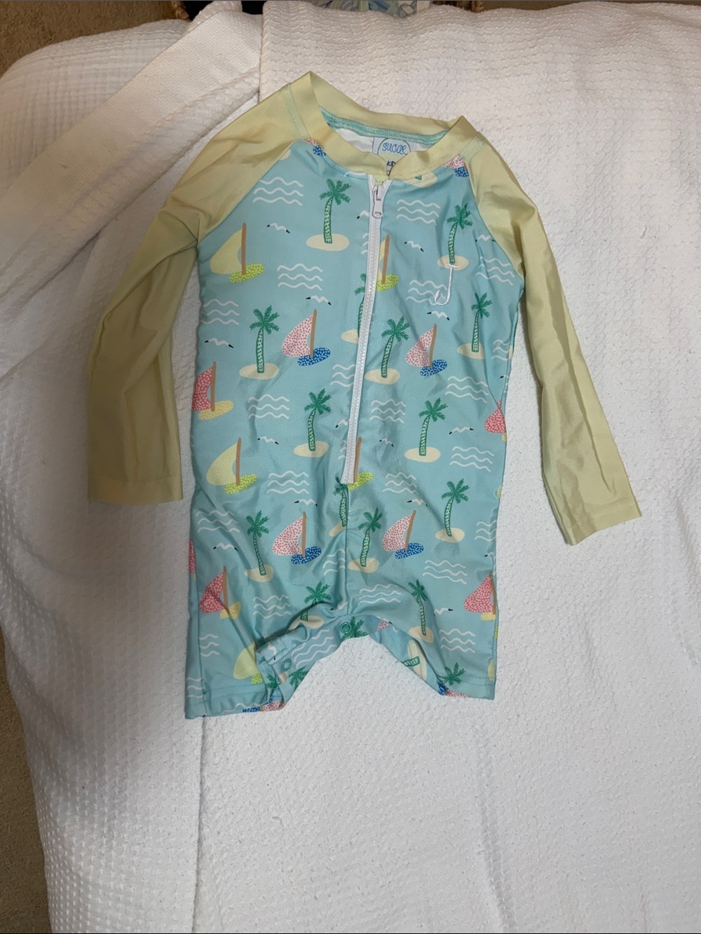 Kids Long-Sleeve One-Piece Swimsuit in Light Blue and Yellow with “J” initial